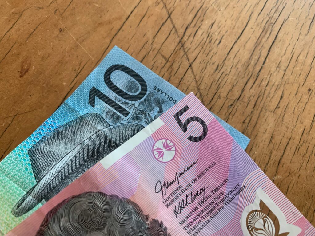Australian currency, highlighting themes of banned remuneration and ASIC regulations.