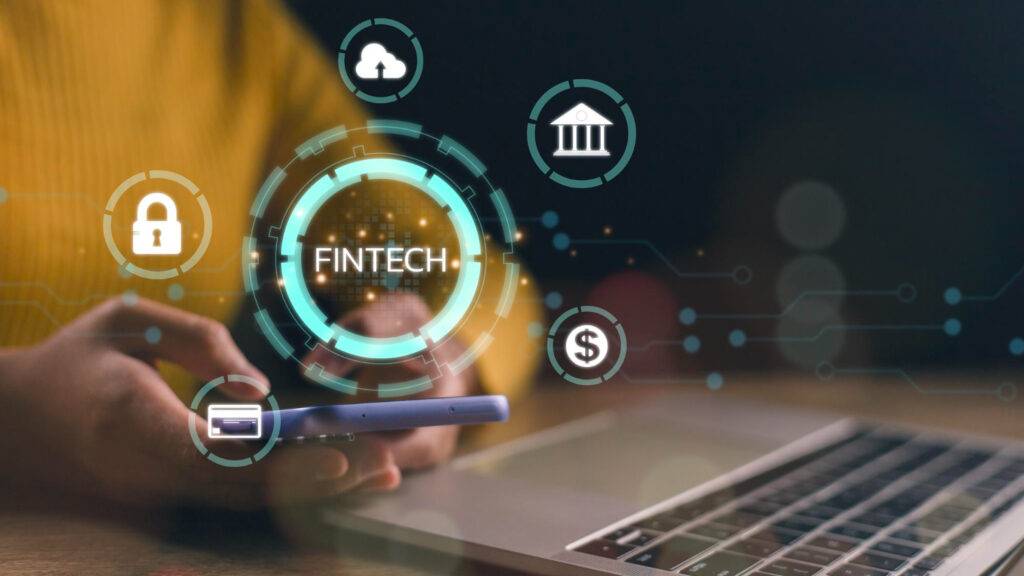 Fintech icons around a person using a smartphone and laptop. Fintech concept.